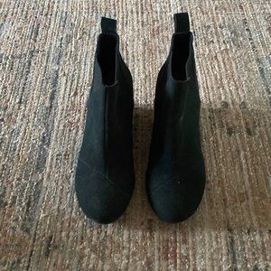 Black wedge booties